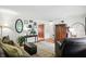 Inviting living room with warm wood floors, plush seating, and stylish decor accents at 7113 Chandler Dr, Indianapolis, IN 46217