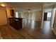 Open concept living room with lots of natural light, vinyl floors and sliding door at 7220 Village Pkwy Dr # 3, Indianapolis, IN 46254