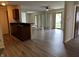 Open concept living room with lots of natural light, vinyl floors and sliding door at 7220 Village Pkwy Dr # 3, Indianapolis, IN 46254