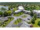 Aerial view showcasing NewPort Bay Condominiums, with its well-maintained grounds, lake views, and inviting community atmosphere at 7601 Newport Bay Dr # 115, Indianapolis, IN 46240