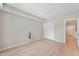 Neutral bedroom featuring hardwood floors, base trim and closet at 7601 Newport Bay Dr # 115, Indianapolis, IN 46240