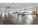 Large garage with a high ceiling and multiple cars at 7601 Newport Bay Dr # 115, Indianapolis, IN 46240