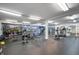 Well-equipped gym at NewPort Bay Condominiums with cardio and weightlifting equipment offering convenient fitness options for residents at 7601 Newport Bay Dr # 115, Indianapolis, IN 46240