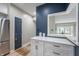 Hallway featuring white countertops, a decorative rug, and a pass-through to another room at 7601 Newport Bay Dr # 115, Indianapolis, IN 46240