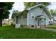 This home features a well-maintained lawn and a generator for backup power at 7727 Huff St, Indianapolis, IN 46259