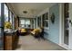 Relaxing front porch with comfortable furniture and views of the neighborhood at 7727 Huff St, Indianapolis, IN 46259