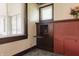Cozy room with built in shelves and a brick fireplace at 7727 Huff St, Indianapolis, IN 46259