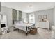 Light and airy bedroom with a window view and a vanity set at 773 Bracknell Dr, Avon, IN 46123