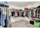 Walk-in closet with ample storage space and organized clothing racks at 773 Bracknell Dr, Avon, IN 46123