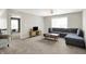 Second floor living room with plush carpet and convenient storage at 773 Bracknell Dr, Avon, IN 46123