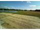 Backyard has views of a pond, with newly laid sod at 7909 Magnolia St, New Palestine, IN 46163