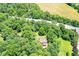 Home surrounded by lush greenery at 8004 Lafayette Rd, Indianapolis, IN 46278
