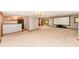 Finished basement with a kitchenette, and projector screen for entertainment at 8004 Lafayette Rd, Indianapolis, IN 46278