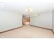 Clean, finished basement with neutral carpet, light paint, and ample open space at 8004 Lafayette Rd, Indianapolis, IN 46278