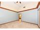 Spacious bedroom with high ceilings, wood trim, and carpet flooring at 8004 Lafayette Rd, Indianapolis, IN 46278