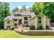 Stunning two-story brick home with manicured landscaping and a welcoming front entrance at 8004 Lafayette Rd, Indianapolis, IN 46278