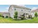 Expansive backyard featuring a patio with pergola and landscaped garden area at 8126 Kilborn Way, Avon, IN 46123
