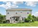 View of the home's backyard featuring a deck and cozy seating area under a pergola at 8126 Kilborn Way, Avon, IN 46123