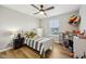 bedroom with hardwood floors and a window offering natural light at 8126 Kilborn Way, Avon, IN 46123