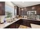 Lovely kitchen featuring stone backsplash, stainless steel appliances and lots of storage at 8126 Kilborn Way, Avon, IN 46123