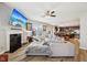 Open-concept living room seamlessly connecting to a modern kitchen and dining area, perfect for entertaining at 8126 Kilborn Way, Avon, IN 46123