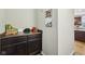 Office area featuring desk space with storage and adjacent kitchen access at 8126 Kilborn Way, Avon, IN 46123