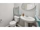 Powder room featuring pedestal sink, oval mirror and grey paint at 8126 Kilborn Way, Avon, IN 46123