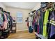 Walk-in closet with ample storage and visible window for natural light at 8126 Kilborn Way, Avon, IN 46123