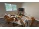 Inviting living room featuring hardwood floors, stylish seating, and a cozy ambiance at 8277 N Waterford Dr, Columbus, IN 47201