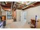 Unfinished basement area with exposed ductwork, utility connections, and potential for customization to suit the buyer at 8301 Cooper Ln, Zionsville, IN 46077