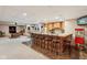 Finished basement with bar, pool table, and dining area, perfect for hosting gatherings at 8301 Cooper Ln, Zionsville, IN 46077