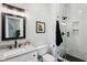Elegant bathroom featuring a glass-enclosed shower, modern fixtures, and stylish vanity at 8301 Cooper Ln, Zionsville, IN 46077