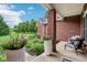 Inviting front porch with comfortable seating and decorative planters, creating a welcoming entrance at 8301 Cooper Ln, Zionsville, IN 46077