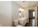 This bathroom features double sinks, a tub with shower, and a view into the next room at 8310 Becks Mill Ln, Indianapolis, IN 46113