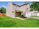 Two-story home with a well-maintained lawn, beautiful landscaping, and a cozy front porch at 8310 Becks Mill Ln, Indianapolis, IN 46113