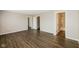 This main bedroom includes neutral walls, walk-in closet, wood-look flooring, and ensuite bath at 8310 Becks Mill Ln, Indianapolis, IN 46113