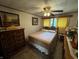 Charming bedroom with hardwood furnishings, vintage accents, and soft lighting at 8664 S Nash Dr, Nineveh, IN 46164