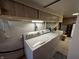 Functional laundry room equipped with a washer and dryer, as well as ample storage space at 8664 S Nash Dr, Nineveh, IN 46164