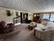 Bright living room with comfortable seating, a large window, and neutral decor at 8664 S Nash Dr, Nineveh, IN 46164