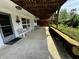 Covered patio with chairs and a bench at 8664 S Nash Dr, Nineveh, IN 46164