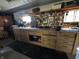 Spacious workshop with a large work bench, lots of storage drawers, and many tools hanging on the wall at 8664 S Nash Dr, Nineveh, IN 46164
