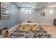 Finished basement features a bed on a large rug, a window, and recessed lighting at 8904 Carnation Dr, Noblesville, IN 46060