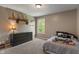 Bedroom featuring carpeted floors, neutral walls and a window, creating a simple space at 8904 Carnation Dr, Noblesville, IN 46060