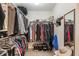 Walk-in closet with ample storage space, clothing racks and a lot of room at 8904 Carnation Dr, Noblesville, IN 46060