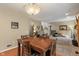 Dining area showcases an open floor plan, connecting living space, kitchen, and staircase at 8904 Carnation Dr, Noblesville, IN 46060