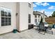 A backyard patio set with outdoor storage and beautiful home exterior at 9653 Cypress Way, Carmel, IN 46032