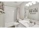 Bright bathroom with subway tile shower and modern vanity at 9653 Cypress Way, Carmel, IN 46032