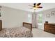 Cozy bedroom with carpet, a wooden dresser, a wooden bedframe, and two windows with natural light at 9653 Cypress Way, Carmel, IN 46032