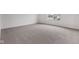 Empty bedroom with neutral carpeting, a window, and natural light at 10416 Crystal Coop Ln, Indianapolis, IN 46235