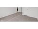 Spacious bedroom featuring neutral carpeting and ample natural light at 10416 Crystal Coop Ln, Indianapolis, IN 46235